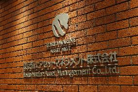 Tokyo Marine Asset Management signboard and logo